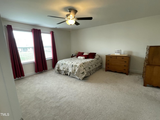30 Junius Birch Trl, Franklinton, NC 27525 - bedroom with carpet floors, a ceiling fan, and baseboards
