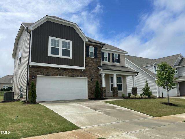 30 Junius Birch Trl, Franklinton, NC 27525 - view of front facade with central AC, an attached garage, a front lawn, and concrete driveway