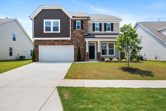 30 Junius Birch Trl, Franklinton, NC 27525 - craftsman house with stone siding, a garage, concrete driveway, and a front yard