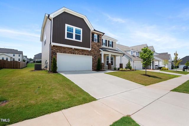 30 Junius Birch Trl, Franklinton, NC 27525 - view of front of house featuring stone siding, a residential view, an attached garage, and driveway