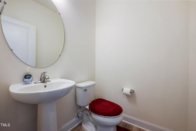 30 Junius Birch Trl, Franklinton, NC 27525 - bathroom with baseboards and wood finished floors