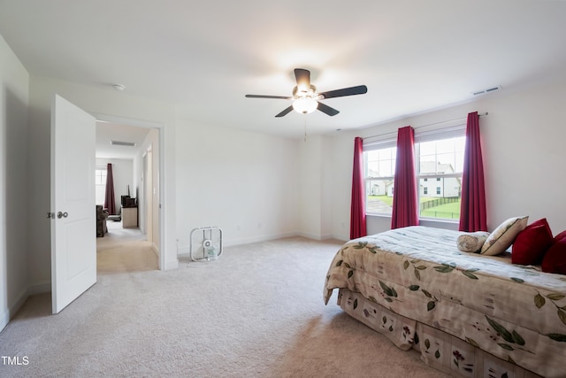 30 Junius Birch Trl, Franklinton, NC 27525 - carpeted bedroom featuring baseboards and ceiling fan