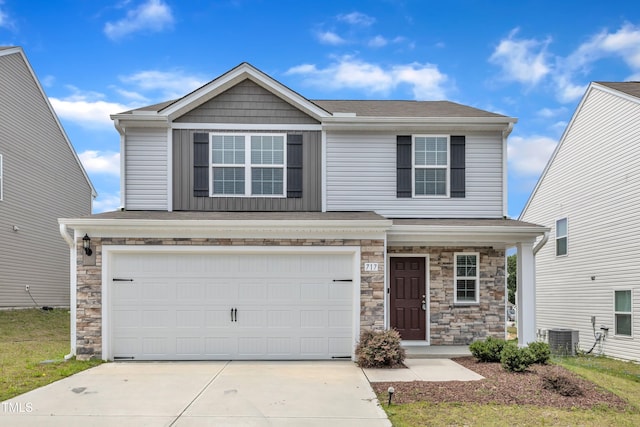 717 Little Patch St, Zebulon, NC 27597 - view of front of house with stone siding, an attached garage, concrete driveway, cooling unit, and covered porch