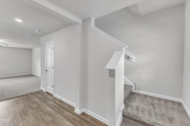 717 Little Patch St, Zebulon, NC 27597 - stairway featuring baseboards and wood finished floors