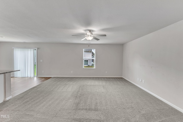 717 Little Patch St, Zebulon, NC 27597 - unfurnished room featuring a ceiling fan, carpet, and baseboards
