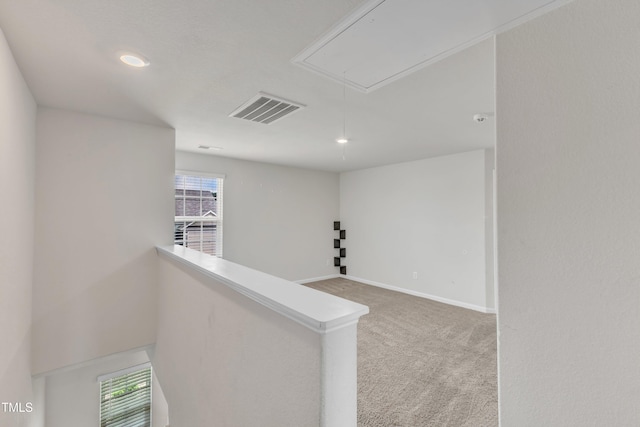 717 Little Patch St, Zebulon, NC 27597 - hall with attic access, carpet floors, an upstairs landing, baseboards, and recessed lighting
