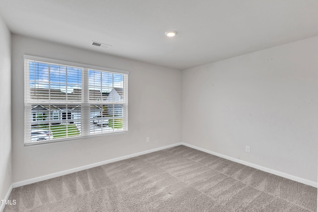 717 Little Patch St, Zebulon, NC 27597 - empty room featuring baseboards and carpet