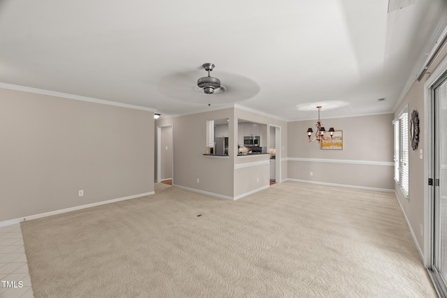 313 Glen Echo Ln Unit J, Cary, NC 27518 - unfurnished living room featuring a chandelier, a ceiling fan, crown molding, baseboards, and light colored carpet