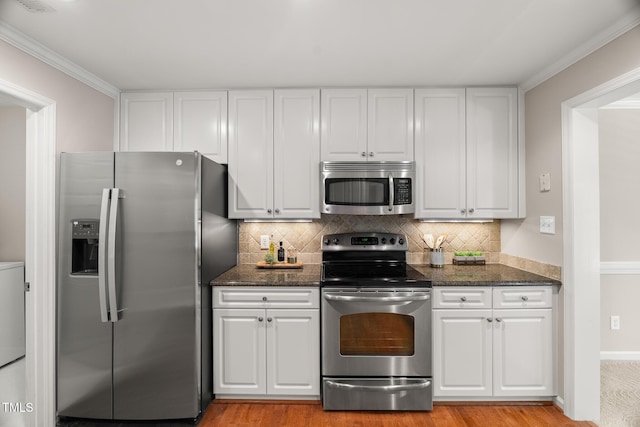 313 Glen Echo Ln Unit J, Cary, NC 27518 - kitchen with appliances with stainless steel finishes, white cabinetry, and dark stone counters