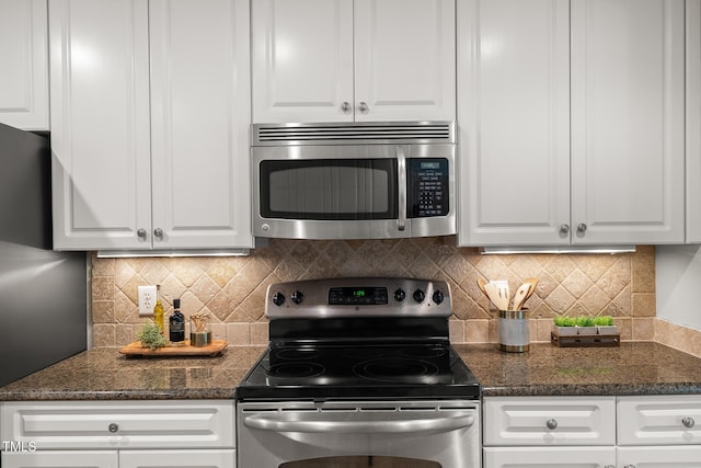 313 Glen Echo Ln Unit J, Cary, NC 27518 - kitchen featuring stainless steel appliances, white cabinets, and decorative backsplash