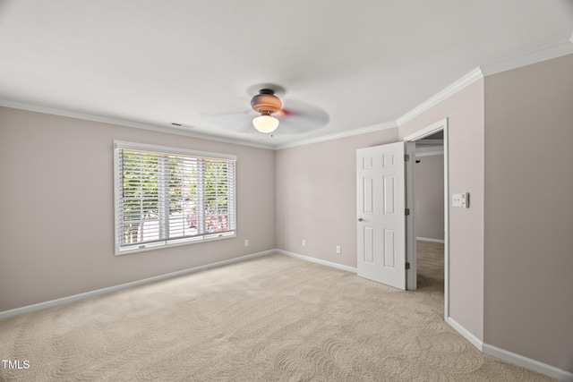 313 Glen Echo Ln Unit J, Cary, NC 27518 - empty room with ceiling fan, crown molding, baseboards, and light colored carpet