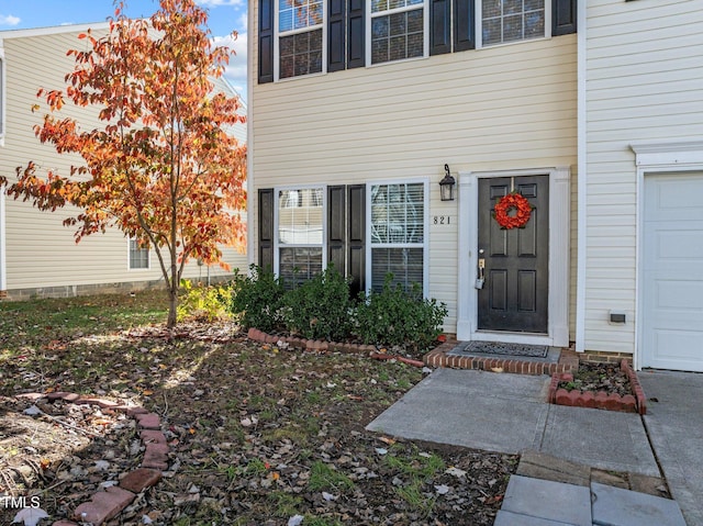 821 Stackhurst Way, Wake Forest, NC 27587 - view of exterior entry with a garage