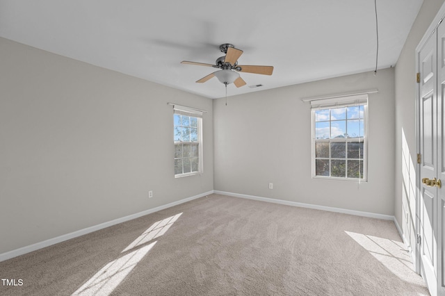 821 Stackhurst Way, Wake Forest, NC 27587 - spare room with plenty of natural light, light carpet, baseboards, and a ceiling fan