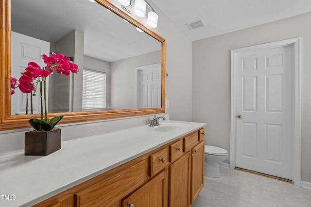 821 Stackhurst Way, Wake Forest, NC 27587 - bathroom featuring vanity, toilet, and tile patterned floors
