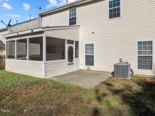 821 Stackhurst Way, Wake Forest, NC 27587 - back of house with central AC unit, a sunroom, a patio, and a yard