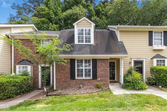 2233 Alpine Rd, Durham, NC 27707 - view of front of property featuring brick siding and a front lawn