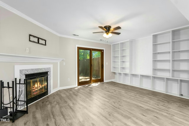 2233 Alpine Rd, Durham, NC 27707 - unfurnished living room featuring ceiling fan, wood finished floors, baseboards, ornamental molding, and a fireplace