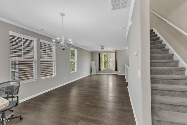 218 Irving Way, Durham, NC 27703 - unfurnished living room with ornamental molding, stairway, a chandelier, dark wood-type flooring, and baseboards