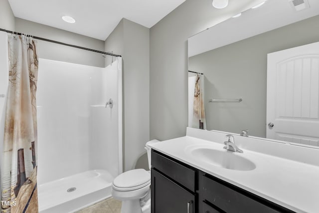 218 Irving Way, Durham, NC 27703 - full bath with a shower with shower curtain, toilet, vanity, and tile patterned floors