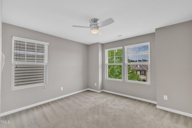 218 Irving Way, Durham, NC 27703 - spare room with baseboards, ceiling fan, and carpet