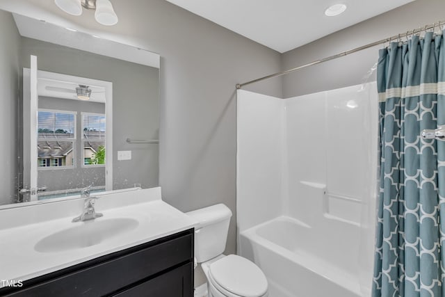218 Irving Way, Durham, NC 27703 - bathroom with toilet, vanity, and shower / tub combo with curtain