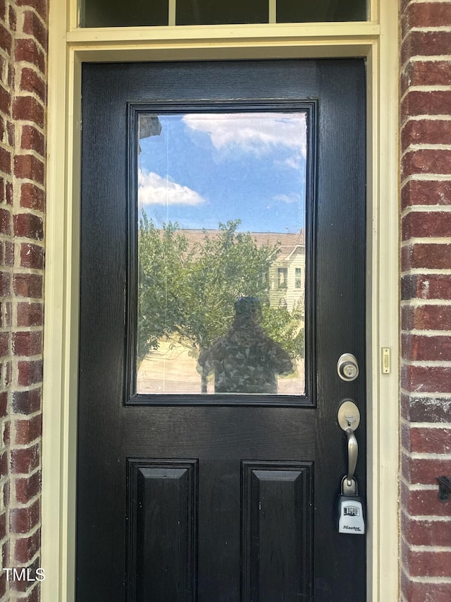 218 Irving Way, Durham, NC 27703 - view of exterior entry with brick siding