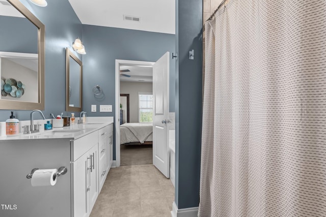 784 Cypress Rd, Cameron, NC 28326 - full bathroom featuring connected bathroom, double vanity, tile patterned floors, and ceiling fan