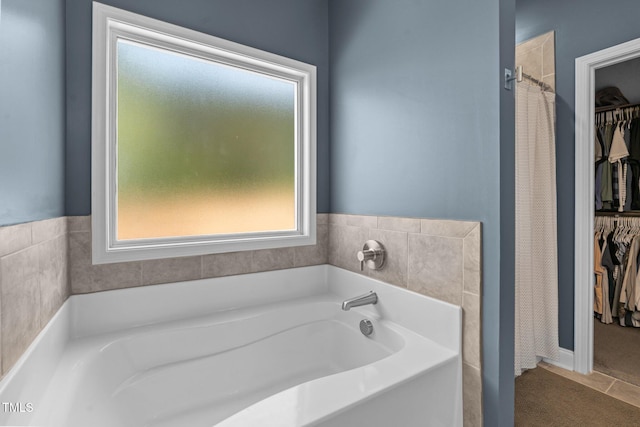 784 Cypress Rd, Cameron, NC 28326 - full bathroom with a spacious closet and a bath