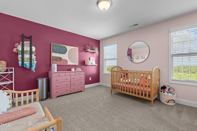 784 Cypress Rd, Cameron, NC 28326 - carpeted bedroom with a nursery area and baseboards