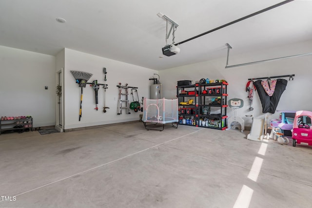 784 Cypress Rd, Cameron, NC 28326 - garage featuring a garage door opener and electric water heater