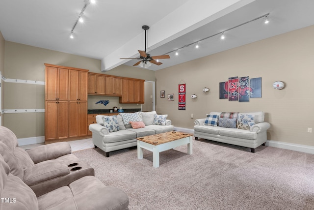 8536 Wolverton Fields Dr, Wake Forest, NC 27587 - living room featuring rail lighting, baseboards, a ceiling fan, and light carpet