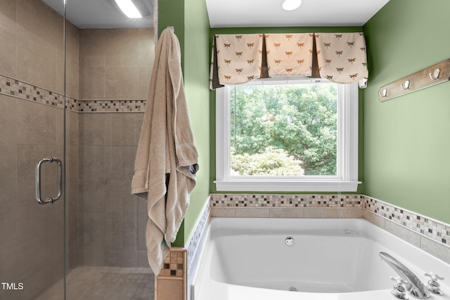 8536 Wolverton Fields Dr, Wake Forest, NC 27587 - bathroom featuring plenty of natural light, a stall shower, and a bath