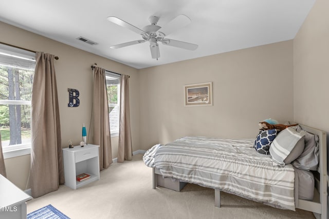 8536 Wolverton Fields Dr, Wake Forest, NC 27587 - carpeted bedroom with a ceiling fan and baseboards