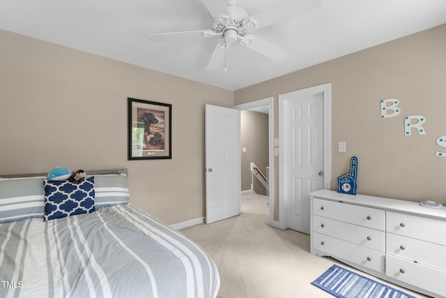 8536 Wolverton Fields Dr, Wake Forest, NC 27587 - bedroom featuring light carpet, baseboards, and a ceiling fan