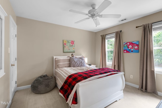 8536 Wolverton Fields Dr, Wake Forest, NC 27587 - bedroom featuring light carpet, baseboards, and multiple windows