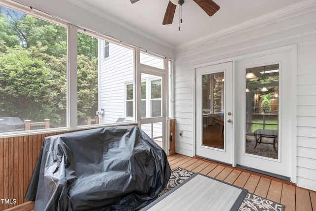 8536 Wolverton Fields Dr, Wake Forest, NC 27587 - sunroom with a deck, a ceiling fan, hardwood / wood-style flooring, and crown molding