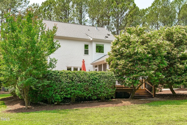 8536 Wolverton Fields Dr, Wake Forest, NC 27587 - rear view of property with a deck, a lawn, and stairs