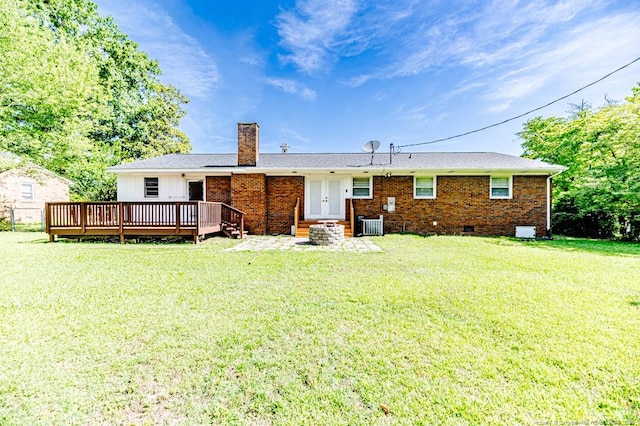 2911 Wicker St, Sanford, NC 27330 - back of house with a chimney, a yard, crawl space, and a deck