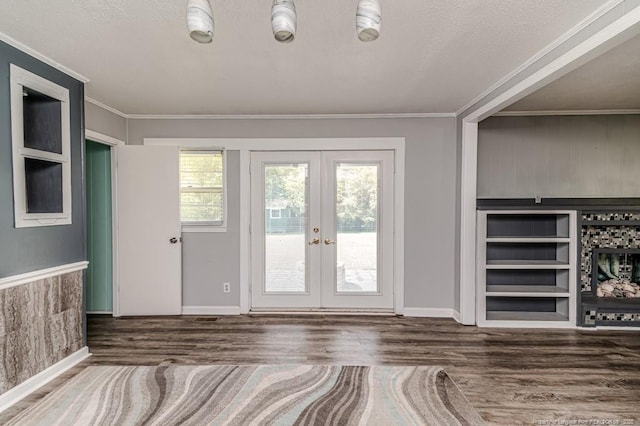 2911 Wicker St, Sanford, NC 27330 - foyer entrance featuring wood finished floors, french doors, ornamental molding, and baseboards