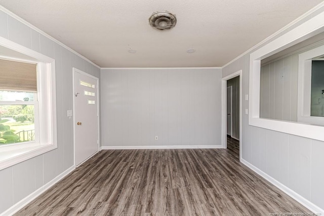 2911 Wicker St, Sanford, NC 27330 - empty room with crown molding, wood finished floors, and baseboards