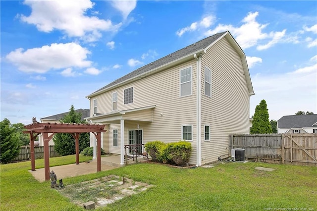 rear view of house with a pergola, central AC, and a patio area
