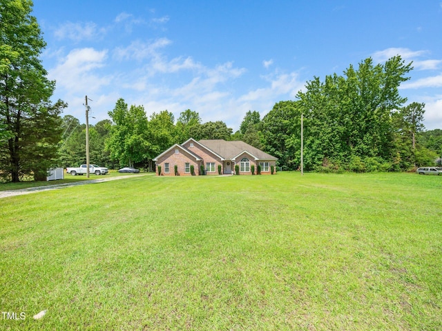 8917 Thompson Mill Rd, Wake Forest, NC 27587 - view of front of property featuring a front yard and driveway