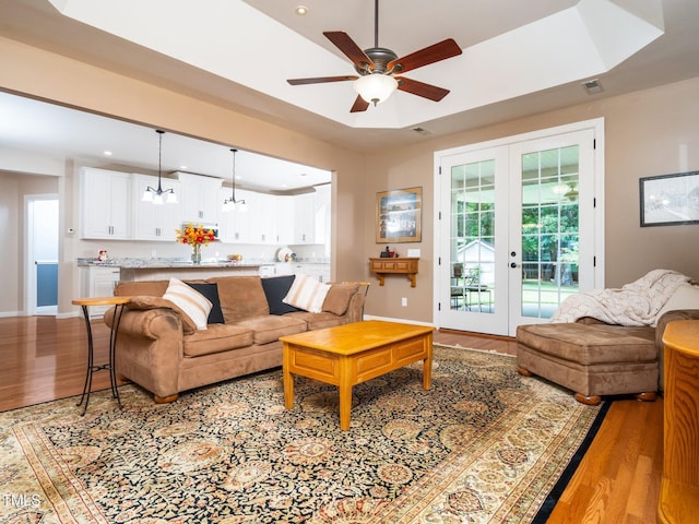 8917 Thompson Mill Rd, Wake Forest, NC 27587 - living room with light wood-style flooring, french doors, ceiling fan, recessed lighting, and baseboards