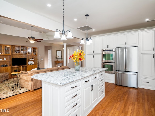 8917 Thompson Mill Rd, Wake Forest, NC 27587 - kitchen featuring appliances with stainless steel finishes, light wood-style floors, decorative light fixtures, recessed lighting, and ceiling fan