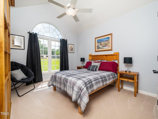 8917 Thompson Mill Rd, Wake Forest, NC 27587 - bedroom with light carpet, lofted ceiling, baseboards, and ceiling fan