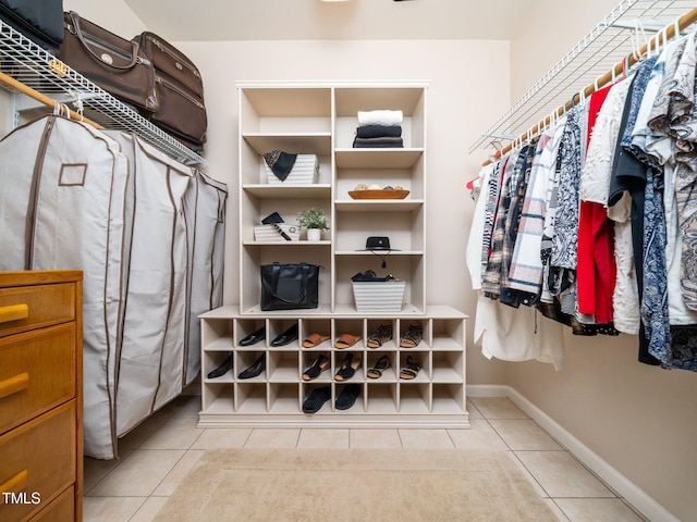 8917 Thompson Mill Rd, Wake Forest, NC 27587 - spacious closet featuring light tile patterned floors
