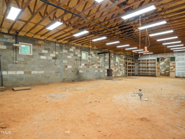 8917 Thompson Mill Rd, Wake Forest, NC 27587 - miscellaneous room with concrete block wall
