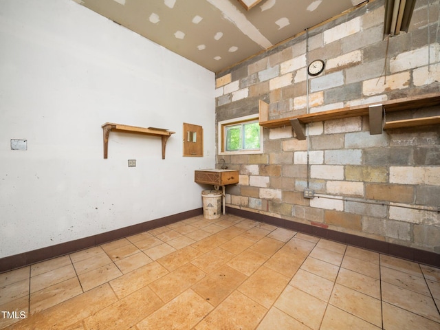 8917 Thompson Mill Rd, Wake Forest, NC 27587 - unfurnished room featuring baseboards and light tile patterned floors