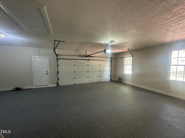 2032 Sherry Lynn Dr, Garner, NC 27529 - garage featuring baseboards