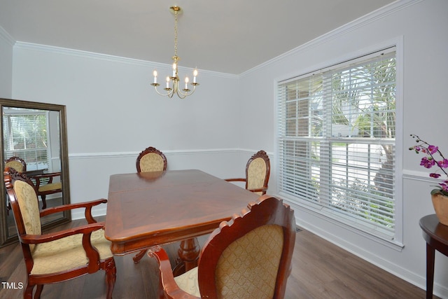 1056 Evening Shade Ave, Rolesville, NC 27571 - dining area with a chandelier, plenty of natural light, wood finished floors, crown molding, and baseboards